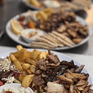 Golden grilled souvlaki skewers cooked to perfection over open flame
